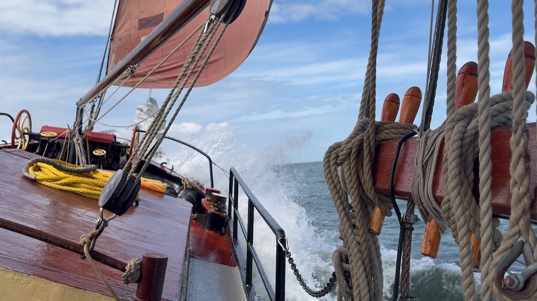 Ship sailing through waves